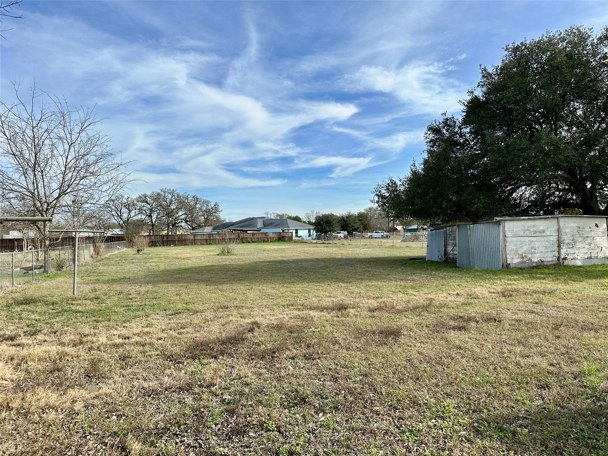 1148 Old Nails Creek Road Giddings, TX 78942 - Photo 17 of 23 a view of a lake with houses in the back