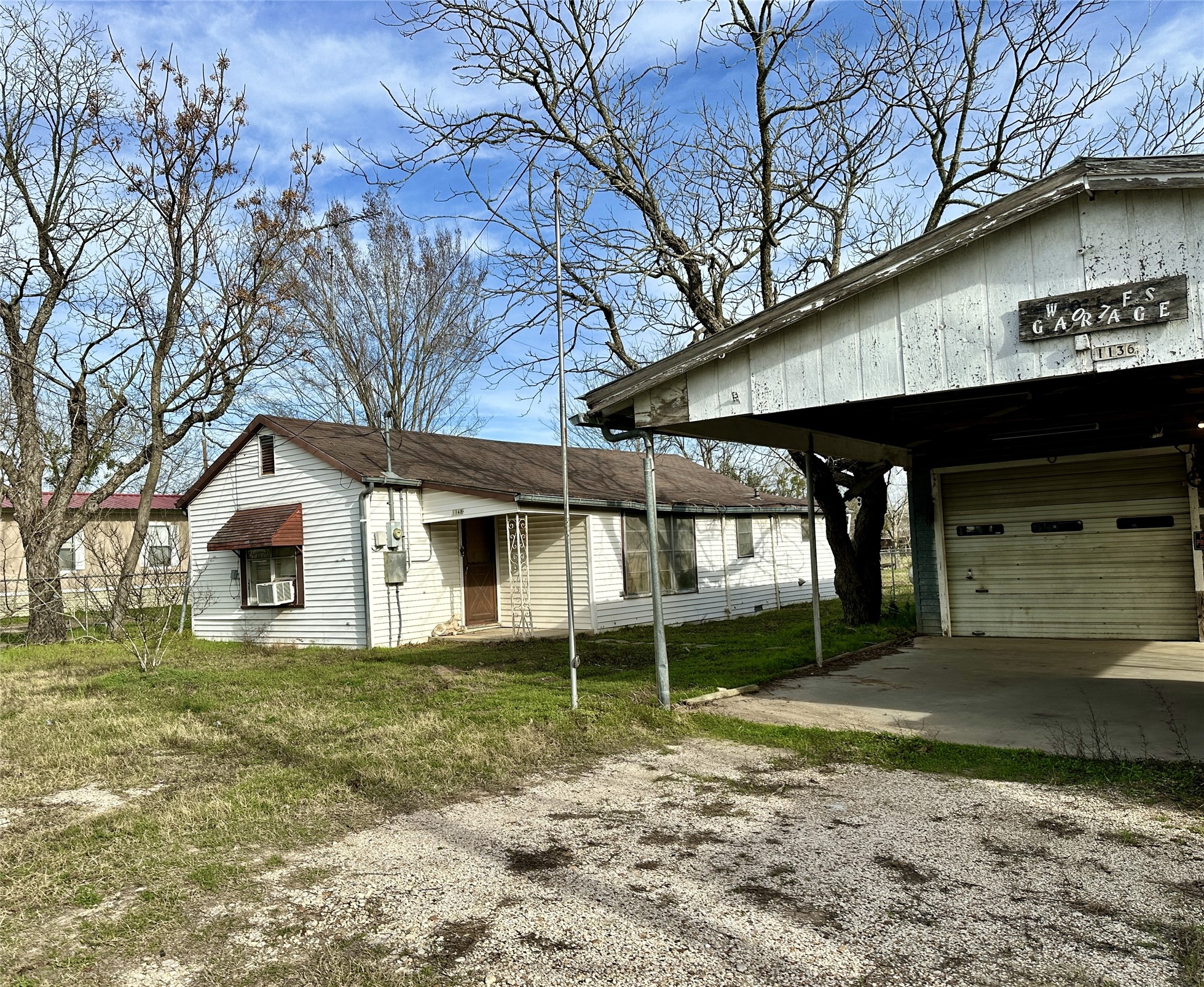 1148 Old Nails Creek Road Giddings, TX 78942 - Photo 19 of 23 a view of a house with a yard