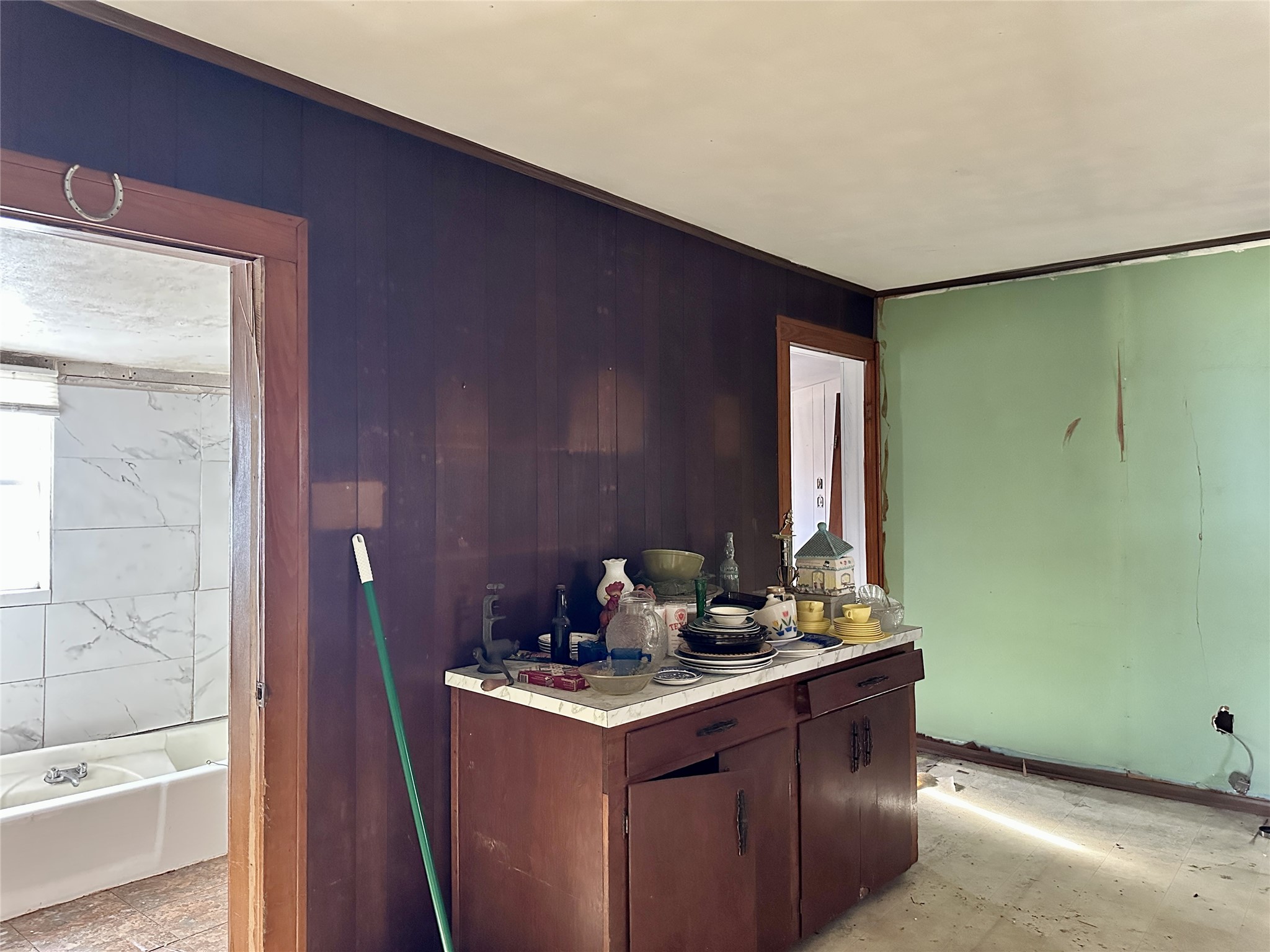1148 Old Nails Creek Road Giddings, TX 78942 - Photo 8 of 23 a room with a sink cabinets and wooden floor