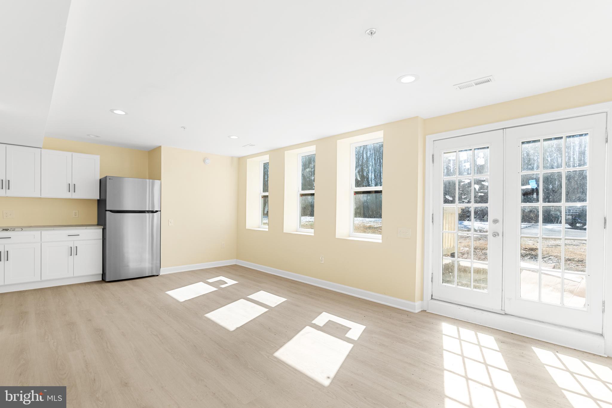 1349 Yorktown Road Annapolis, MD 21409 - Photo 16 of 35 a view of an empty room with a window