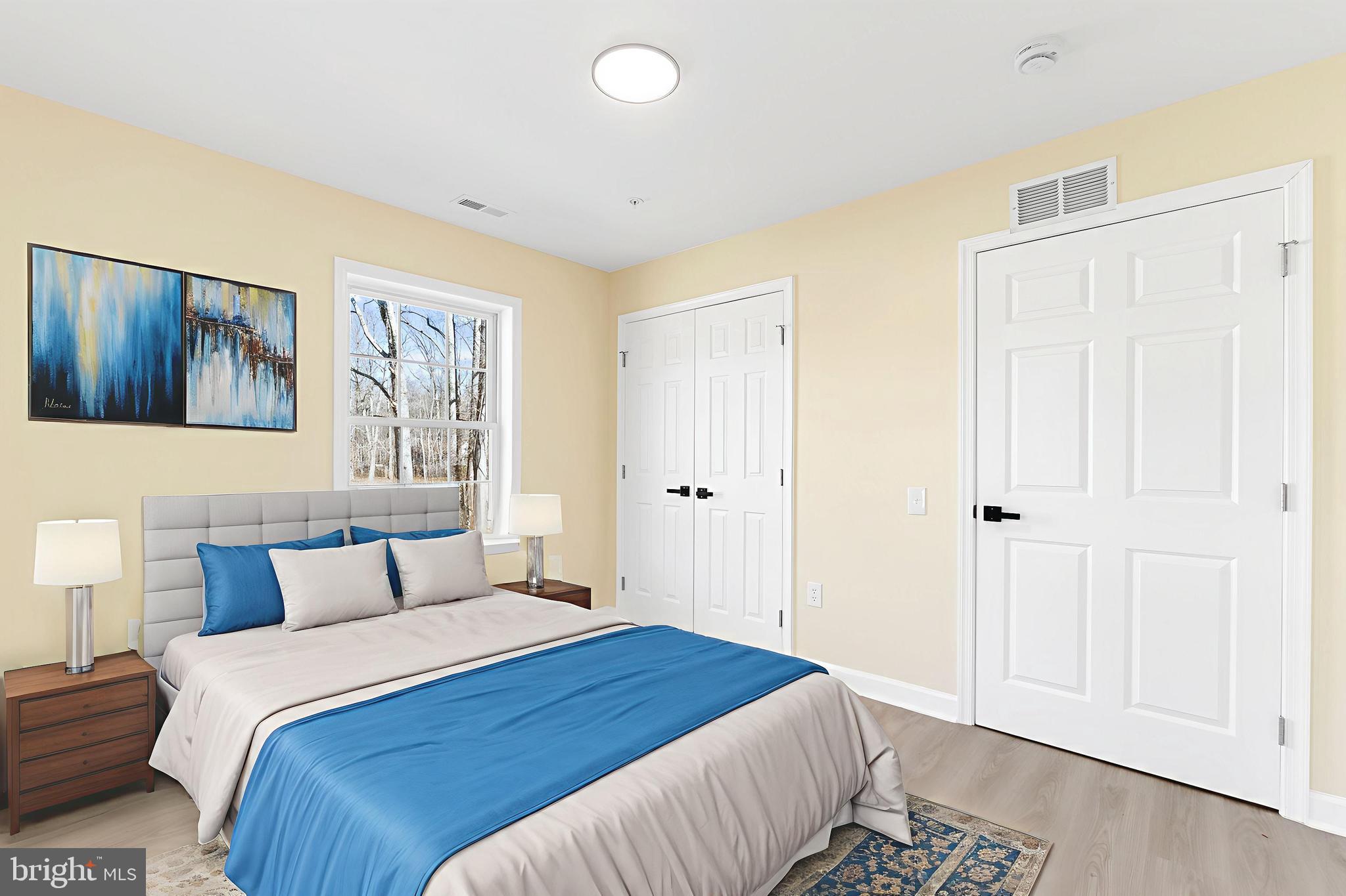 1349 Yorktown Road Annapolis, MD 21409 - Photo 29 of 35 a bedroom with a bed and a painting on the wall