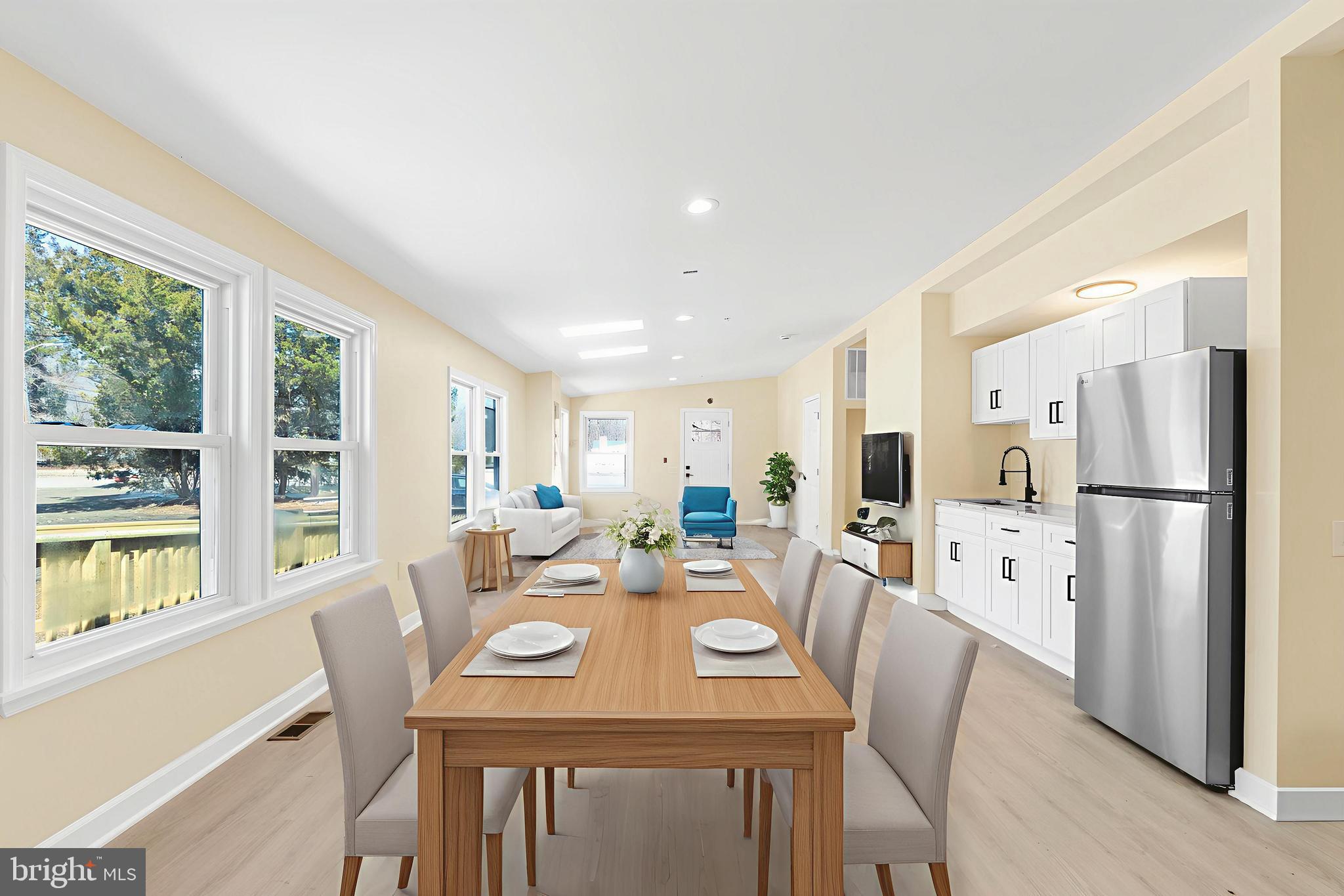 1349 Yorktown Road Annapolis, MD 21409 - Photo 6 of 35 a view of a dining room with furniture window and wooden floor