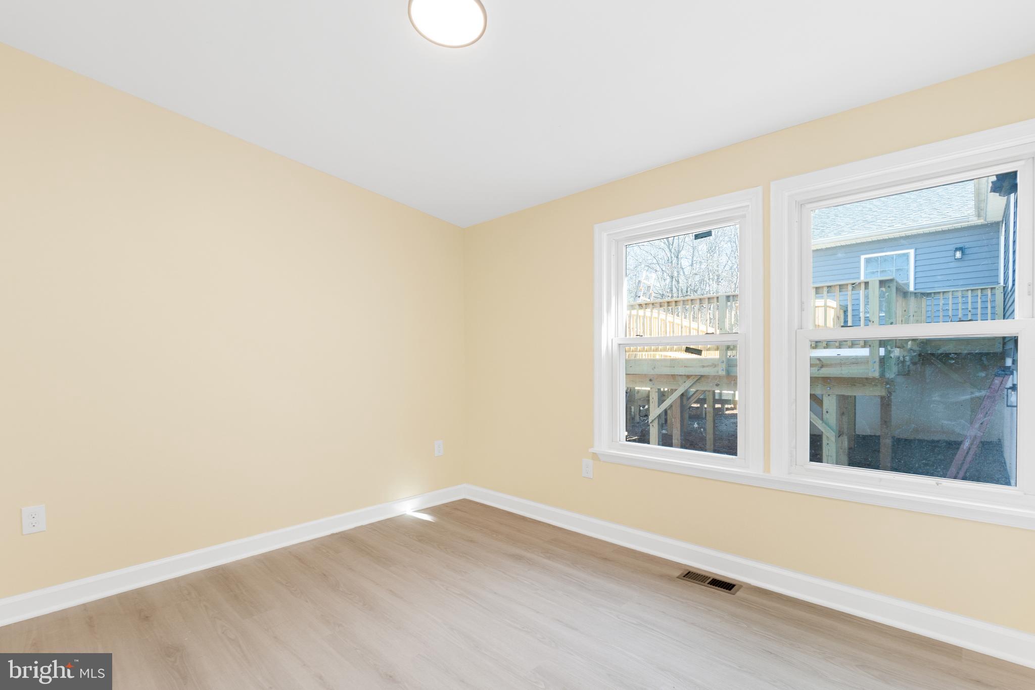 1349 Yorktown Road Annapolis, MD 21409 - Photo 10 of 35 an empty room with windows