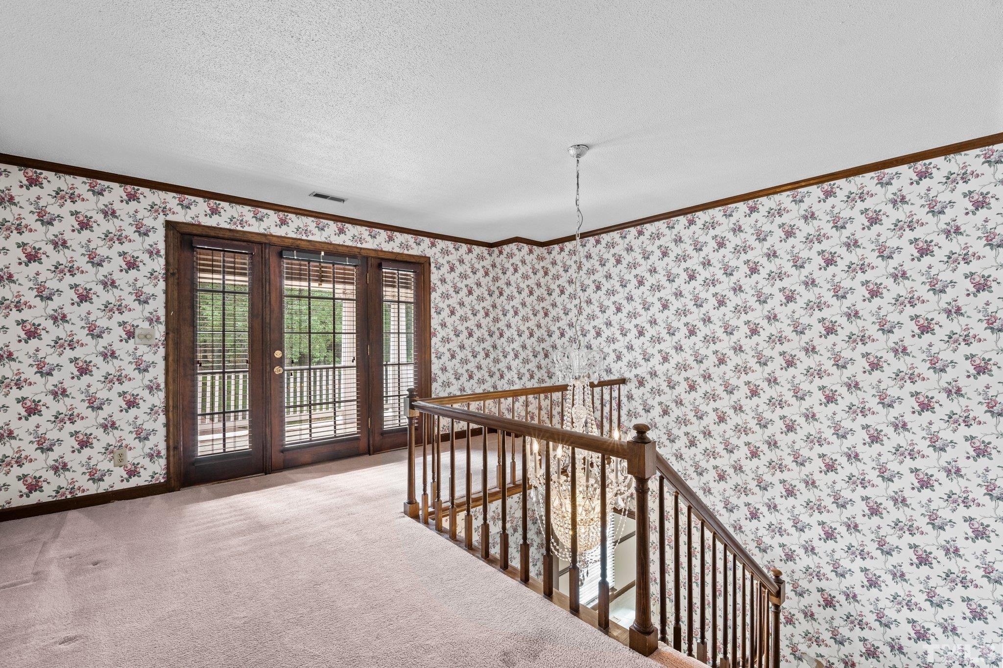 7525 South Tanglewild Drive Raleigh, NC 27613 - Photo 25 of 50 a view of a black and white gate