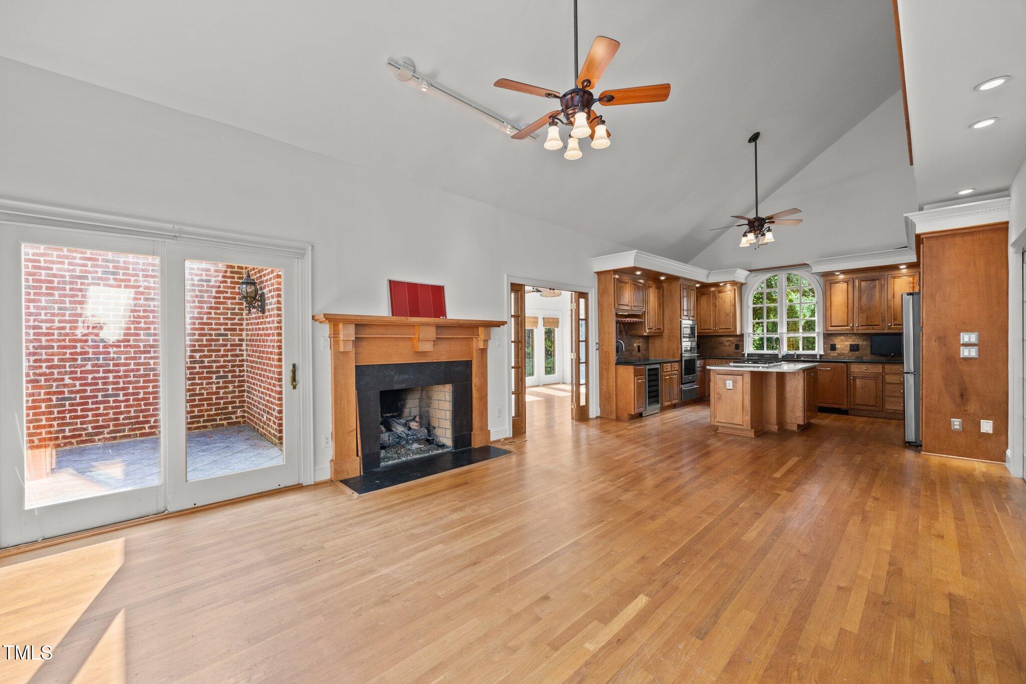 3604 Eden Croft Drive Raleigh, NC 27612 - Photo 21 of 49 a living room with furniture and a fireplace