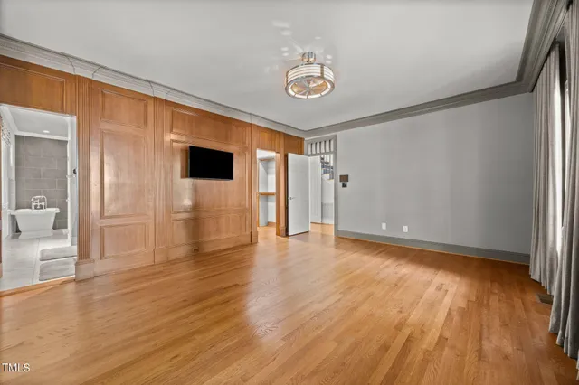 a view of a livingroom with wooden floor