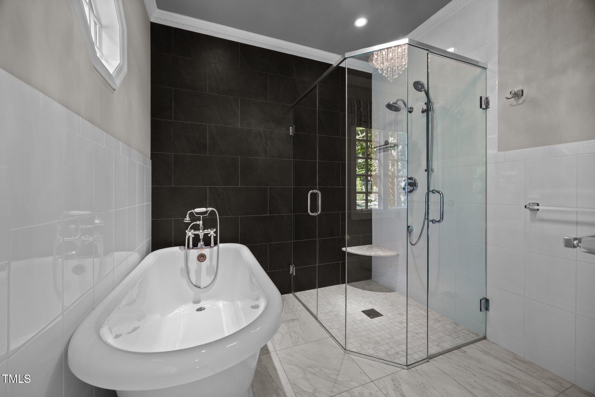 3604 Eden Croft Drive Raleigh, NC 27612 - Photo 32 of 49 a bathroom with a shower and a sink