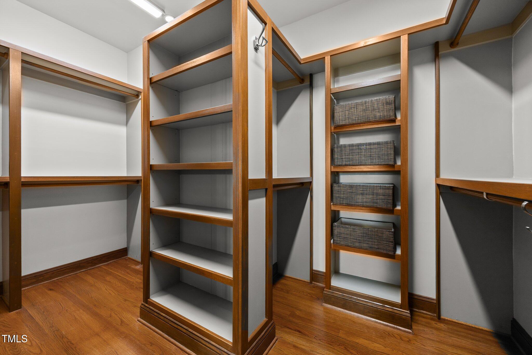 3604 Eden Croft Drive Raleigh, NC 27612 - Photo 34 of 49 a view of walk in closet with empty racks