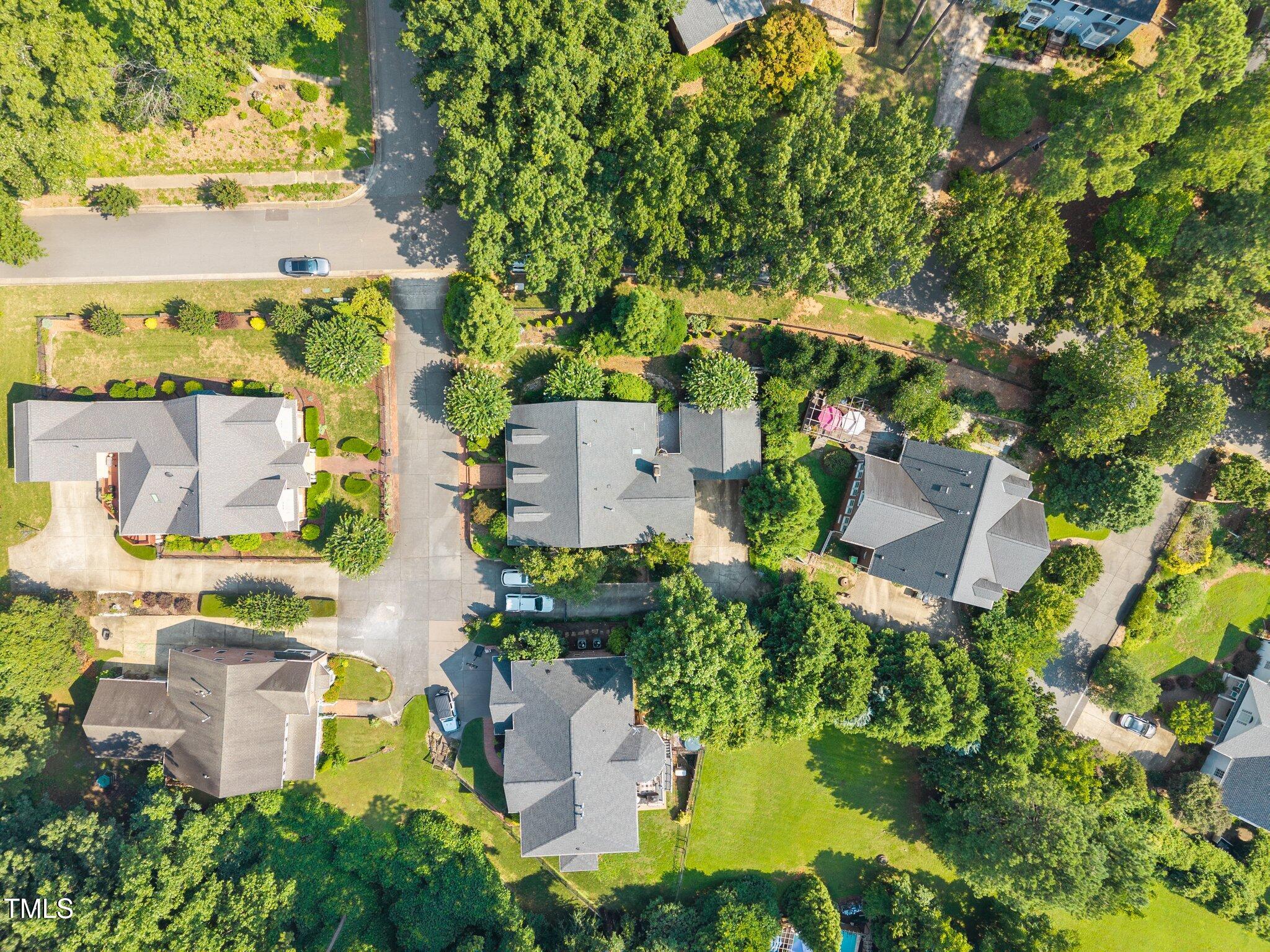 3604 Eden Croft Drive Raleigh, NC 27612 - Photo 48 of 49 an aerial view of residential house with outdoor space and trees all around