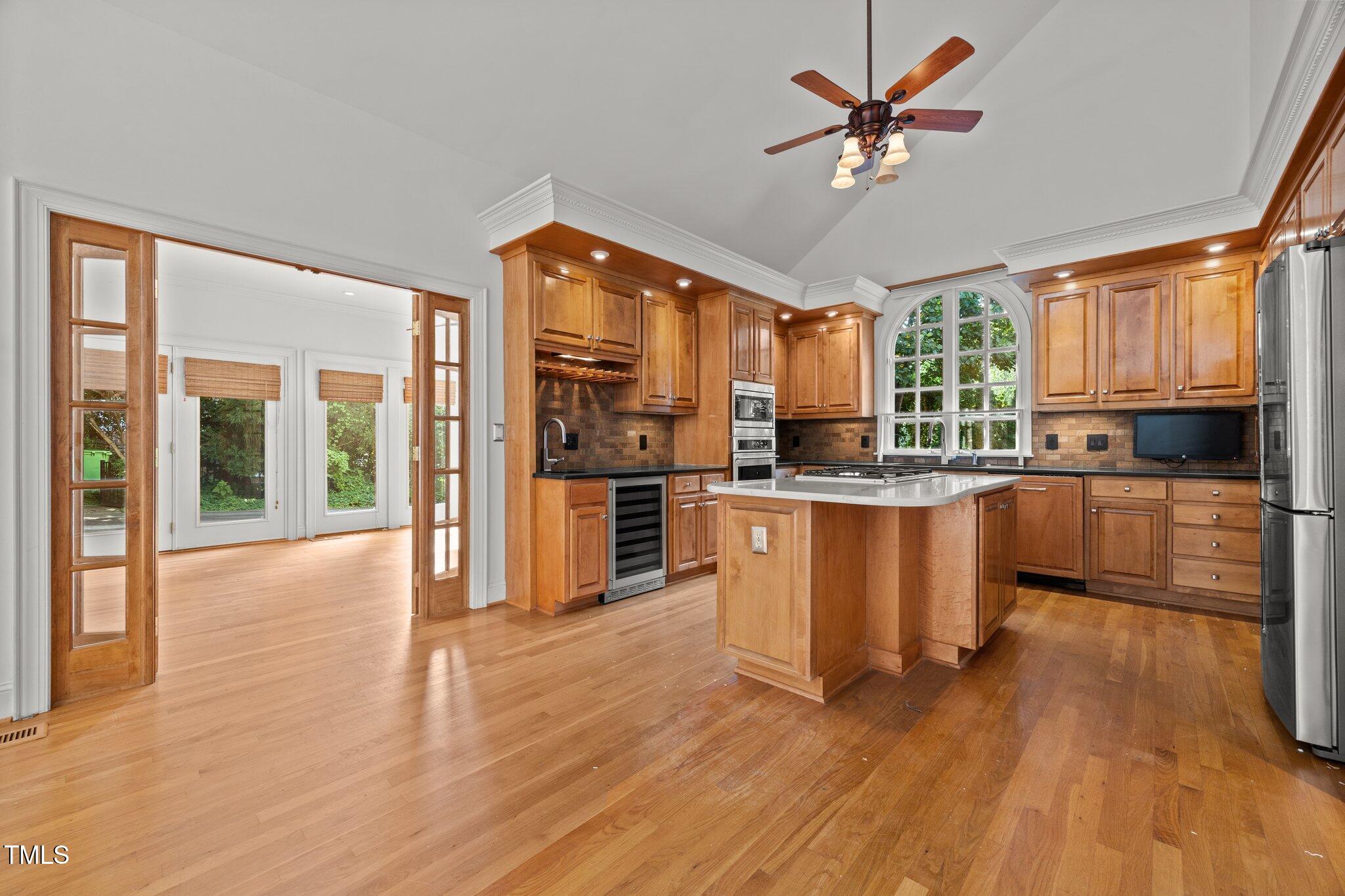 3604 Eden Croft Drive Raleigh, NC 27612 - Photo 10 of 49 a large kitchen with lots of counter space a sink and stainless steel appliances