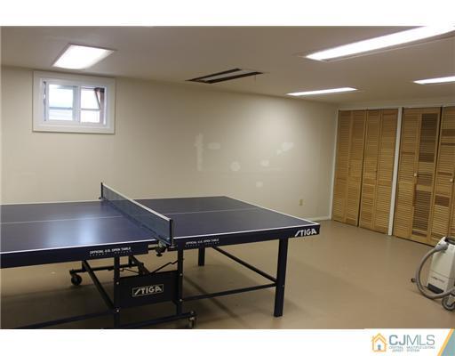36 Huntington Road Edison, NJ 08820 - Photo 14 of 19 a view of a room with gym equipment