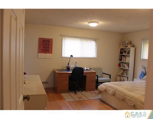 36 Huntington Road Edison, NJ 08820 - Photo 7 of 19 a balcony with furniture and window