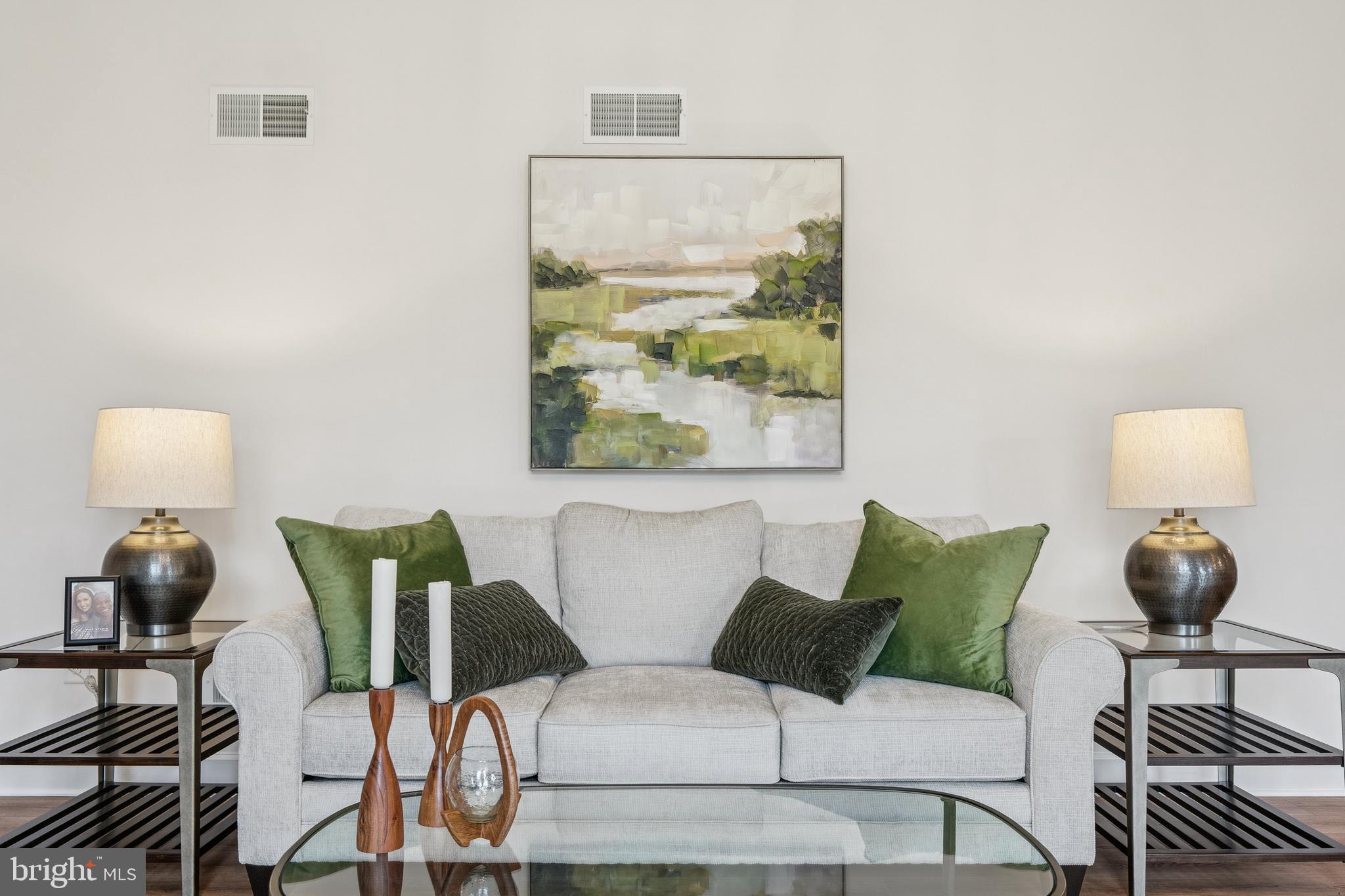 150 Piedmont Way, Unit 101 Hanover, PA 17331 - Photo 20 of 40 a living room with furniture and a window