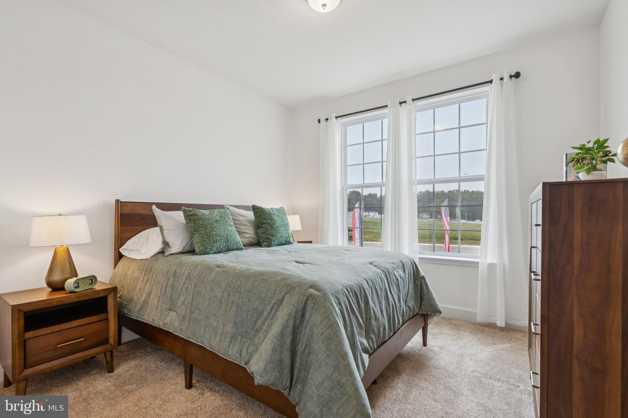 150 Piedmont Way, Unit 101 Hanover, PA 17331 - Photo 33 of 40 a bedroom with a bed and a window