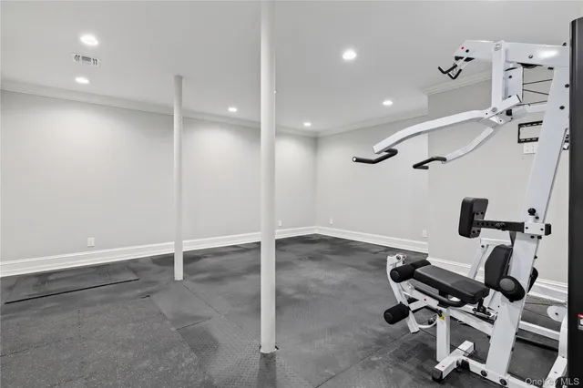 a bathroom with a window and a projector