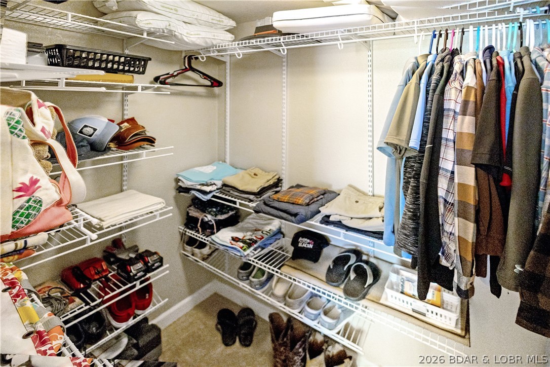 68 Lighthouse Road, Unit 121 Lake Ozark, MO 65049 - Photo 14 of 30 Master closet.