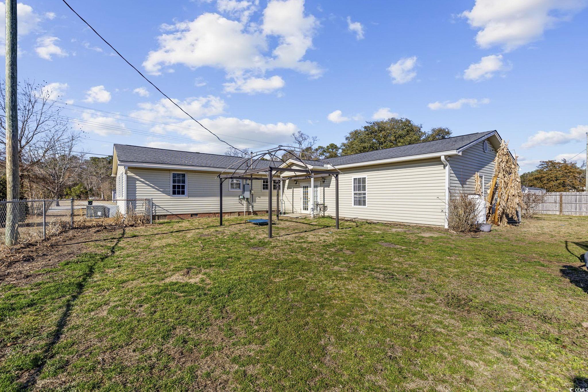 1109 Dunn Short Cut Road Conway, SC 29527 - Photo 29 of 37 Rear view of house with a gazebo and a lawn