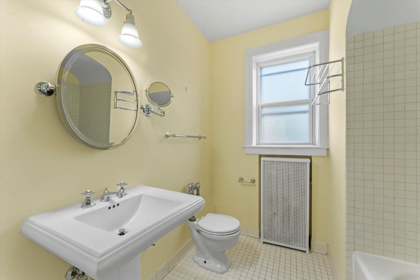 1316 Maple Avenue, Unit E3 Evanston, IL 60201 - Photo 12 of 22 a bathroom with a sink and a mirror