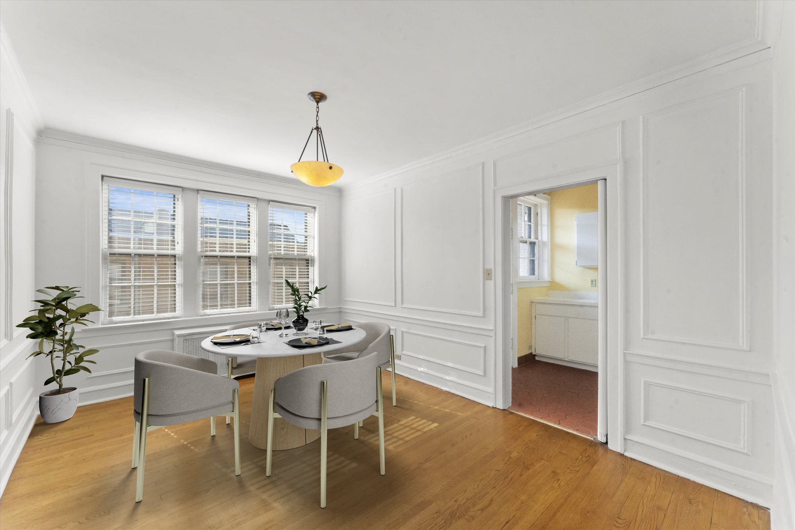 1316 Maple Avenue, Unit E3 Evanston, IL 60201 - Photo 6 of 22 a dining room with furniture window and wooden floor