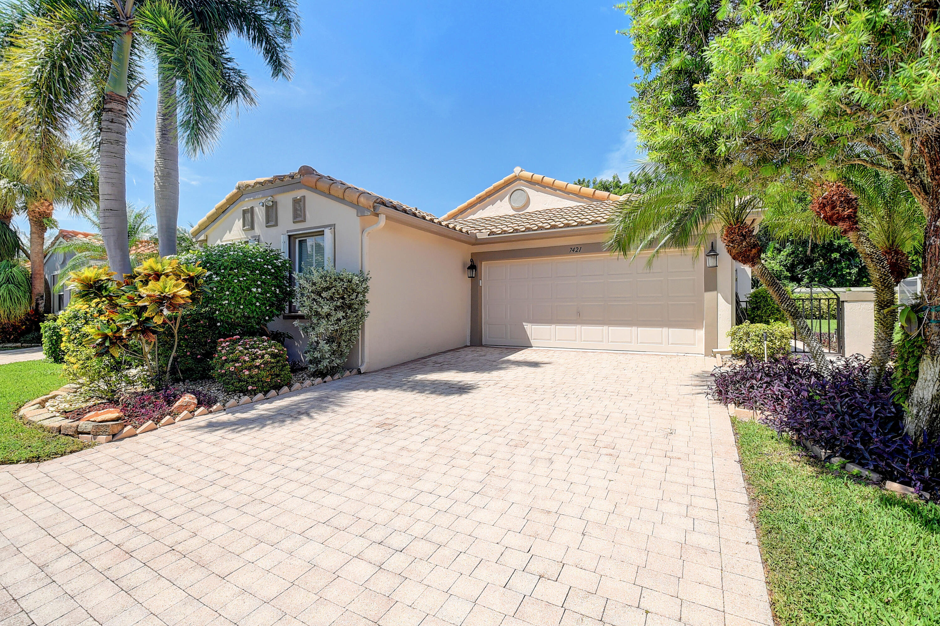 7421 Chorale Road Boynton Beach, FL 33437 - Photo 32 of 74 Front of House