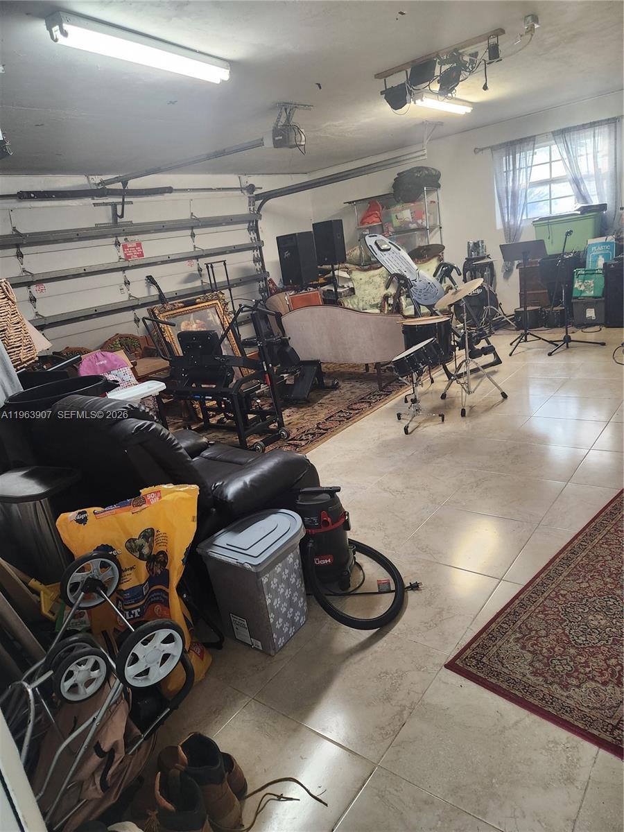 23801 Southwest 217th Avenue Homestead, FL 33031 - Photo 12 of 14 a view of a room with gym equipment