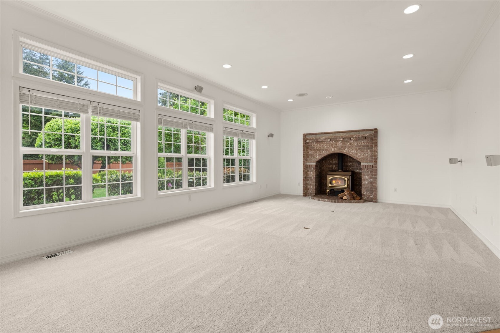 9609 346th Street South Roy, WA 98580 - Photo 11 of 37 an empty room with furniture and a fireplace