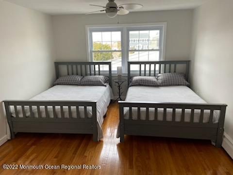 452 Marathon Court Lavallette, NJ 08735 - Photo 11 of 20 a bedroom with two beds and a window