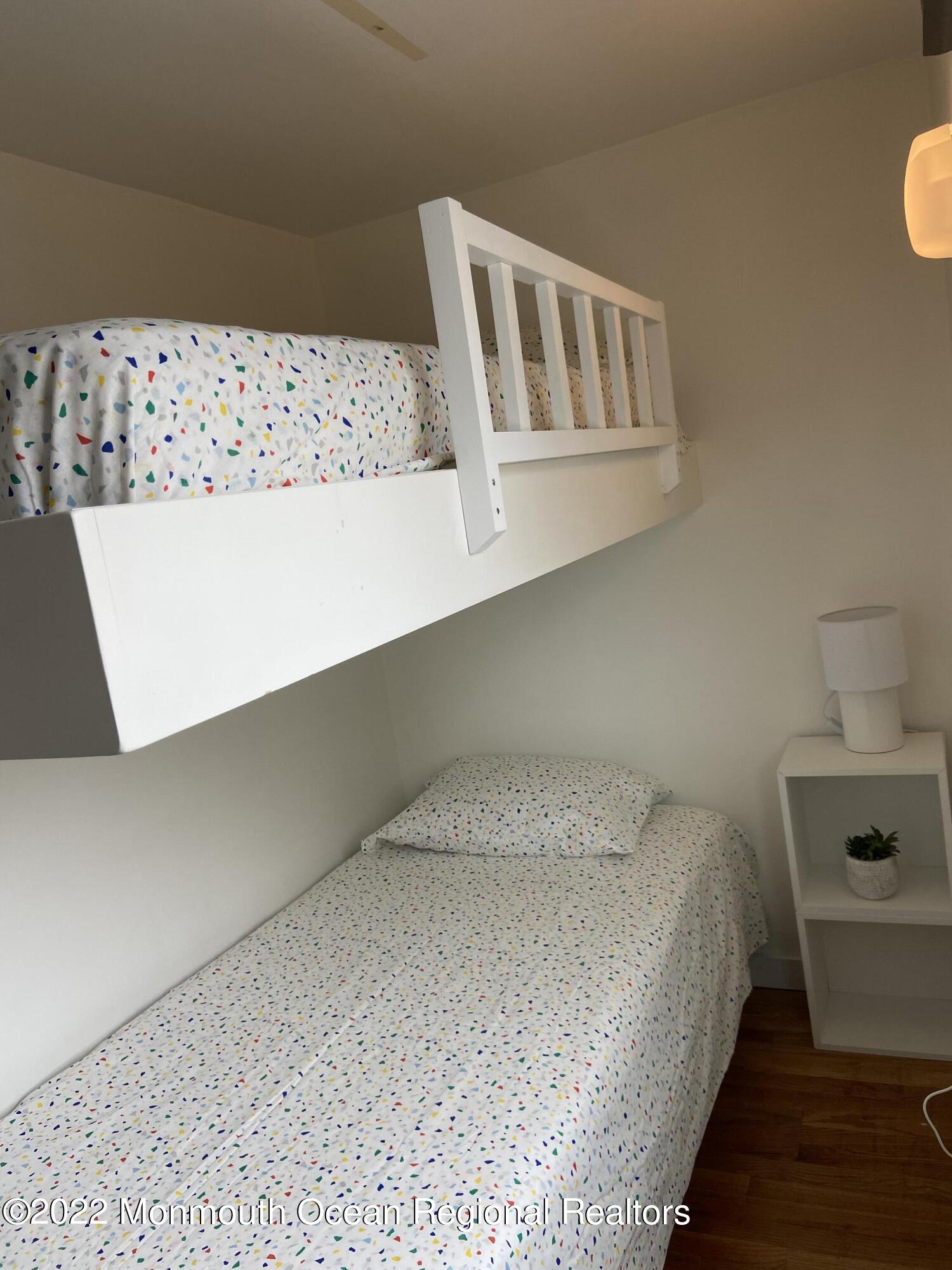 452 Marathon Court Lavallette, NJ 08735 - Photo 14 of 20 a bedroom with a bed and a window