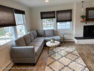452 Marathon Court Lavallette, NJ 08735 - Photo 5 of 20 a living room with furniture and a flat screen tv