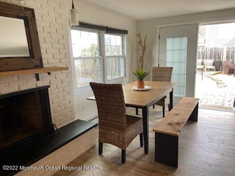 452 Marathon Court Lavallette, NJ 08735 - Photo 6 of 20 a view of a dining room with furniture window and wooden floor
