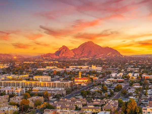 an aerial view of residential houses and city view