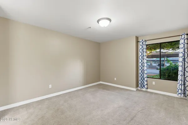 an empty room with windows