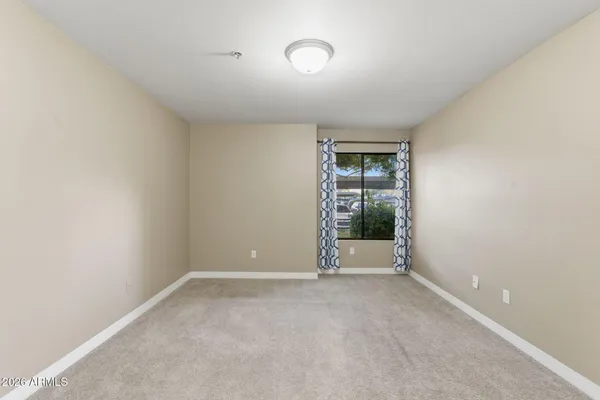 an empty room with windows