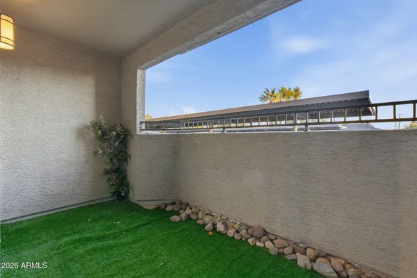 a view of a room with rack on the wall