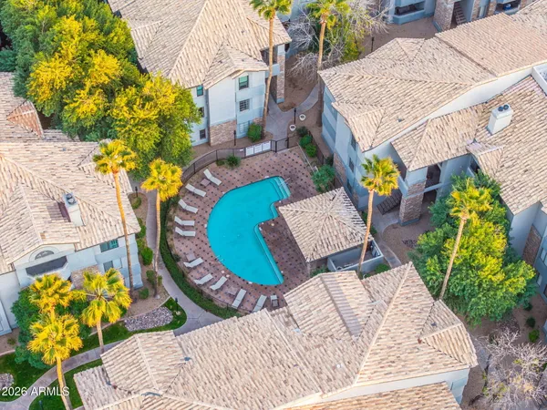 a view of outdoor kitchen and patio