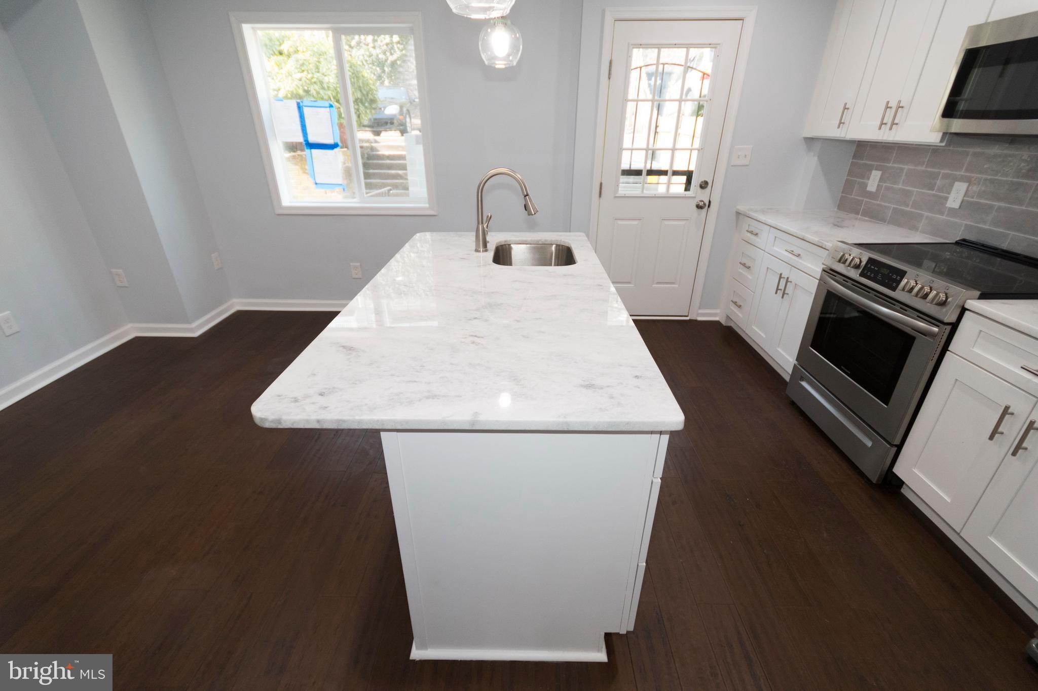 1371 Morris Road Southeast Washington, DC 20020 - Photo 13 of 46 Kitchen Island