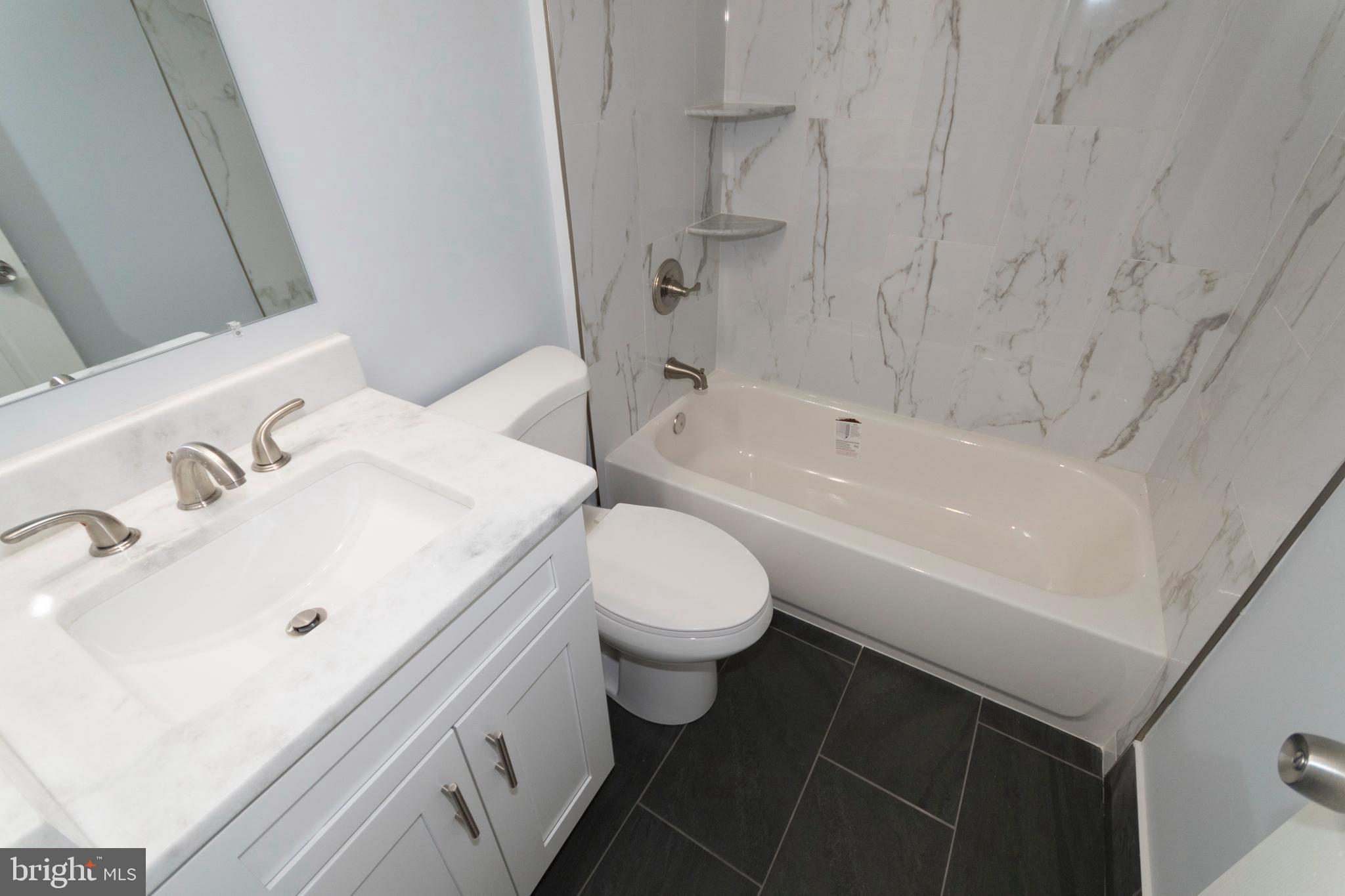 1371 Morris Road Southeast Washington, DC 20020 - Photo 24 of 46 Upstairs Bathroom, marble walls.