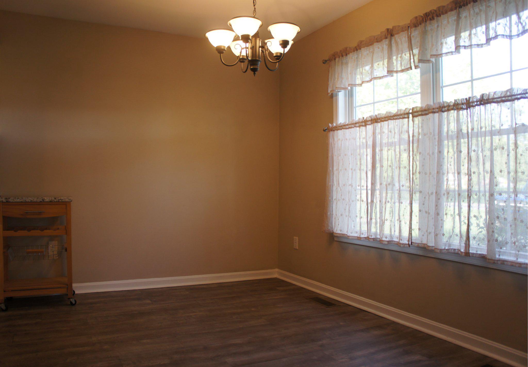 8981 Sharptown Road Laurel, DE 19956 - Photo 15 of 34 Dining space open to the kitchen.