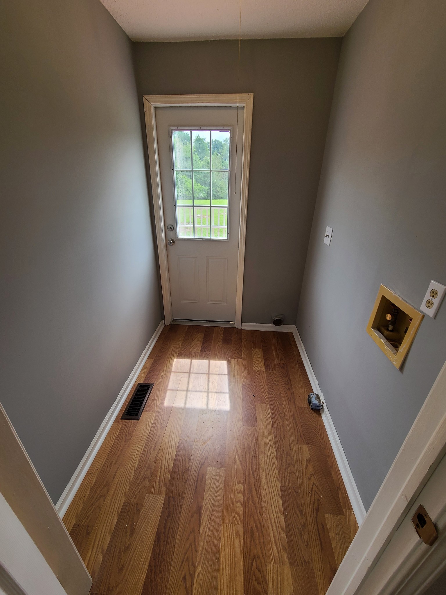 89 Bassham Road Five Points, TN 38457 - Photo 9 of 48 an empty room with wooden floor and windows
