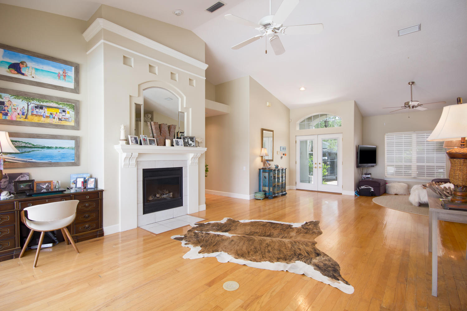 754 Bay Grove Road Freeport, FL 32439 - Photo 7 of 23 a living room with furniture a fireplace and a flat screen tv