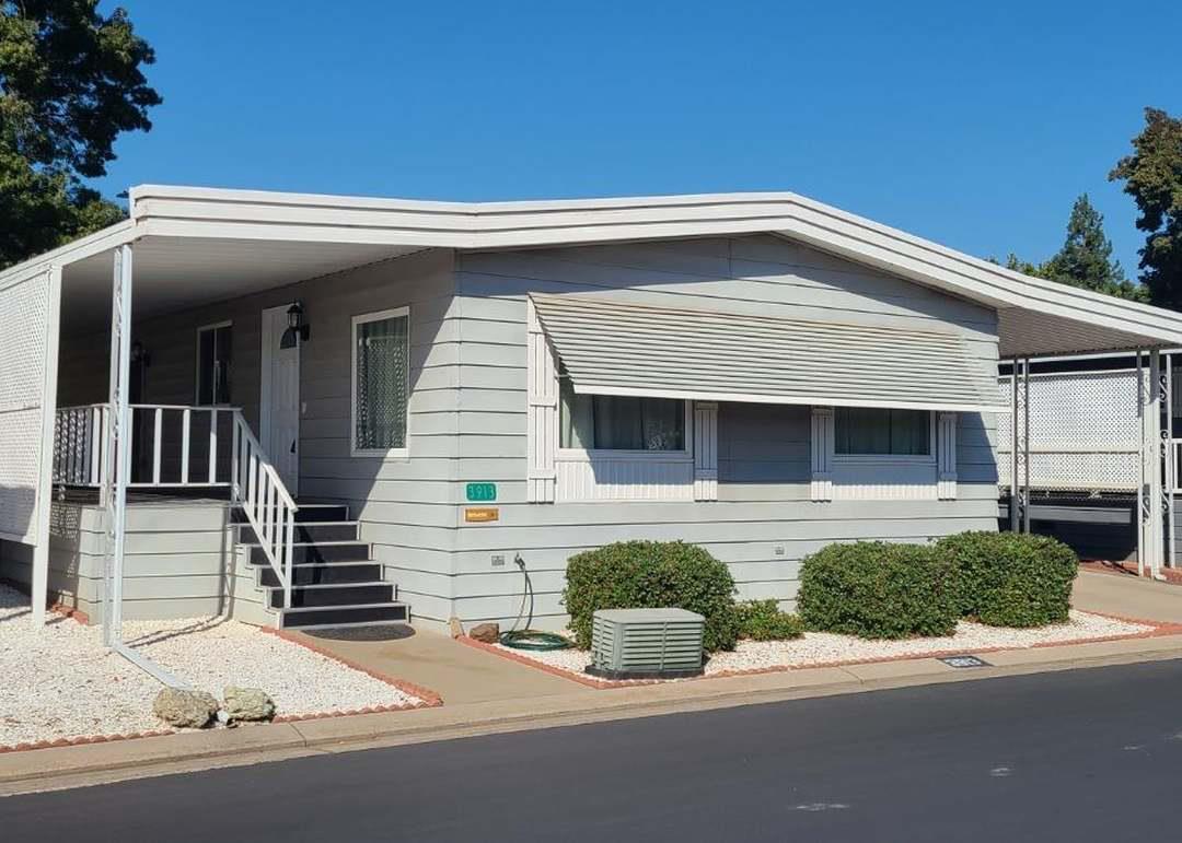 3913 Waimea Lane Modesto, CA 95355 - Photo 1 of 32 a front view of a house with garage