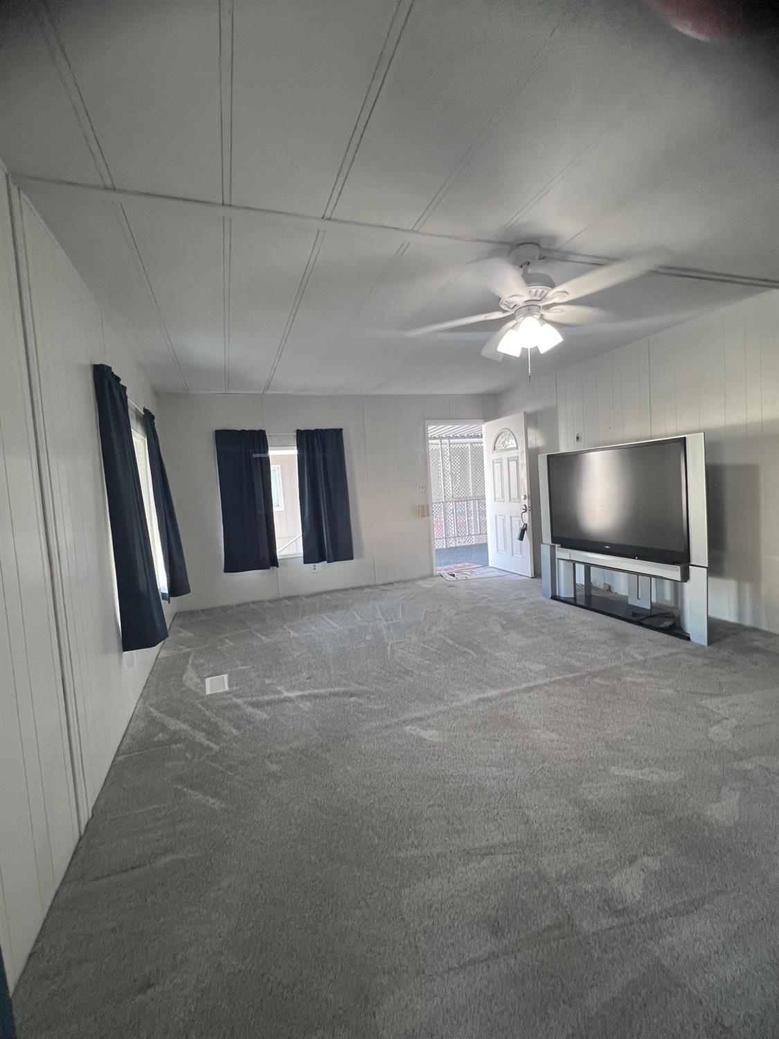 3913 Waimea Lane Modesto, CA 95355 - Photo 11 of 32 a view of livingroom with hardwood floor and window