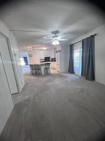 a kitchen with stainless steel appliances a refrigerator and a stove top oven
