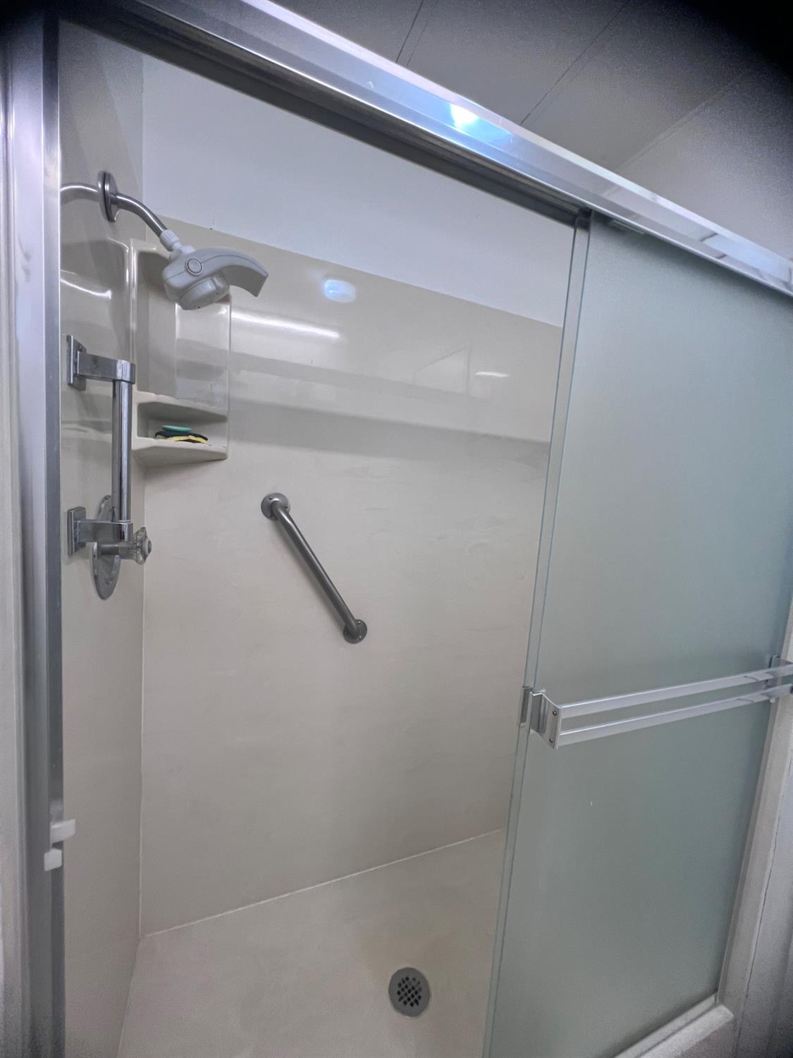 3913 Waimea Lane Modesto, CA 95355 - Photo 25 of 32 a bathroom with a shower