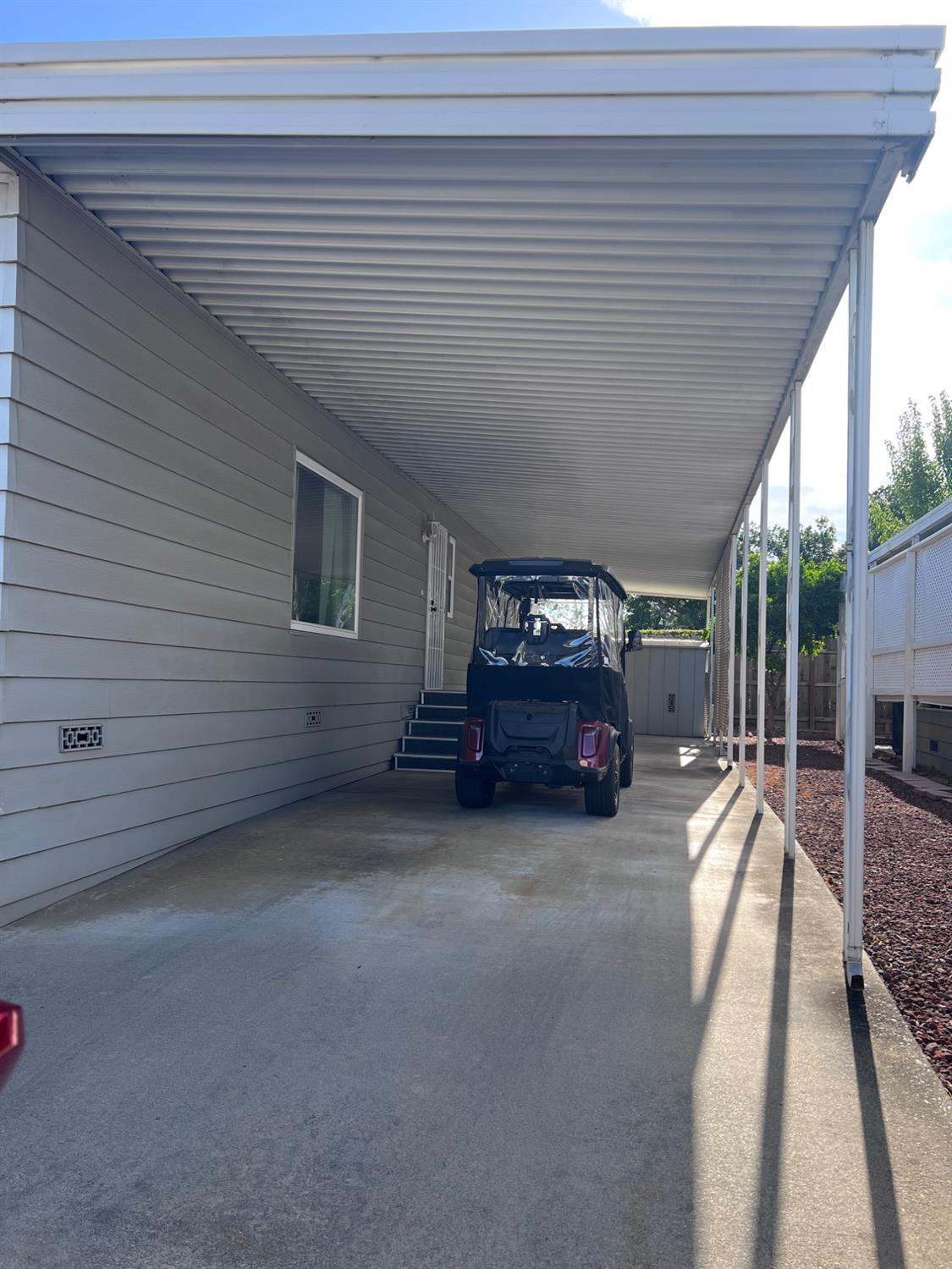 3913 Waimea Lane Modesto, CA 95355 - Photo 6 of 32 a view of a livingroom with furniture and floor to ceiling window