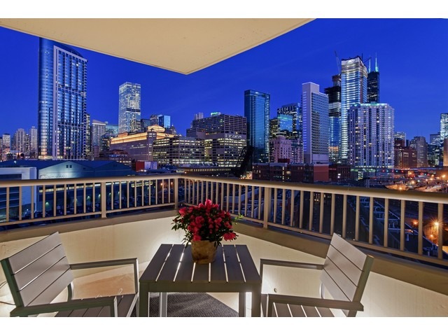 501 North Clinton Street, Unit 904 Chicago, IL 60654 - Photo 16 of 25 a view of a balcony with furniture