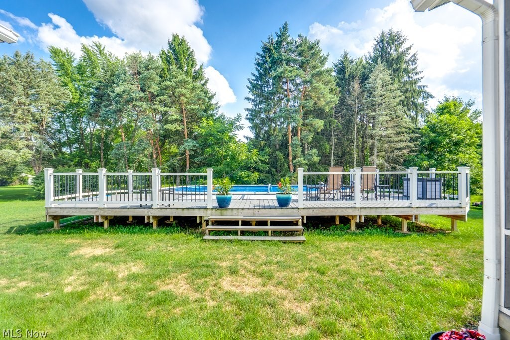 826 Stewart Road Kent, OH 44240 - Photo 7 of 43 View of yard featuring a swimming pool side deck