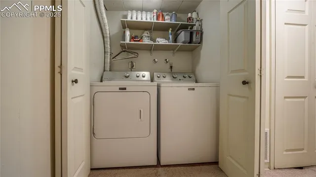 a utility room with dryer and washer