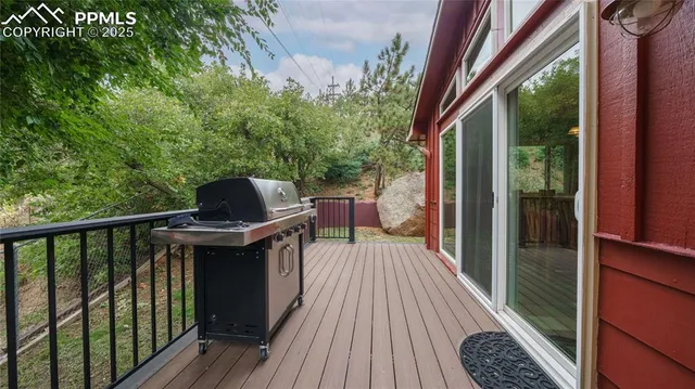 a balcony view with a hardwood floor