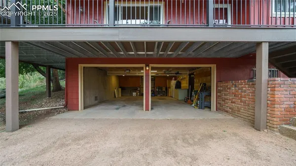 a view of a house with porch and furniture